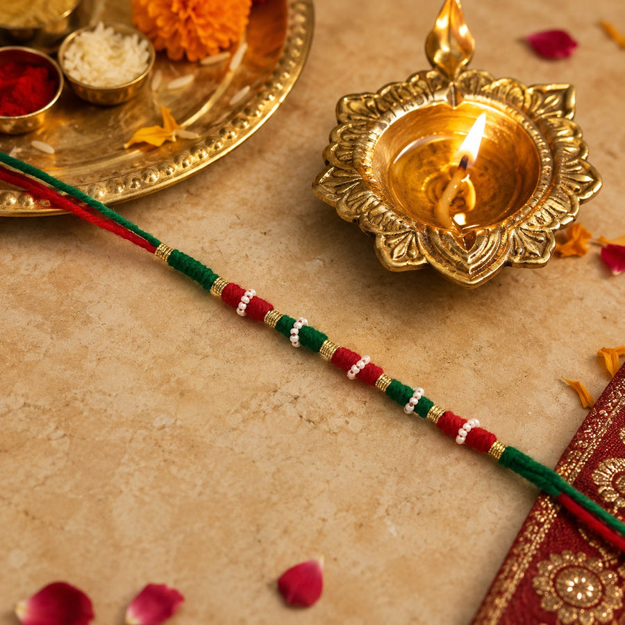 Cute Designer Rakhi with Red and Green Thread Beads (1 Pc)
